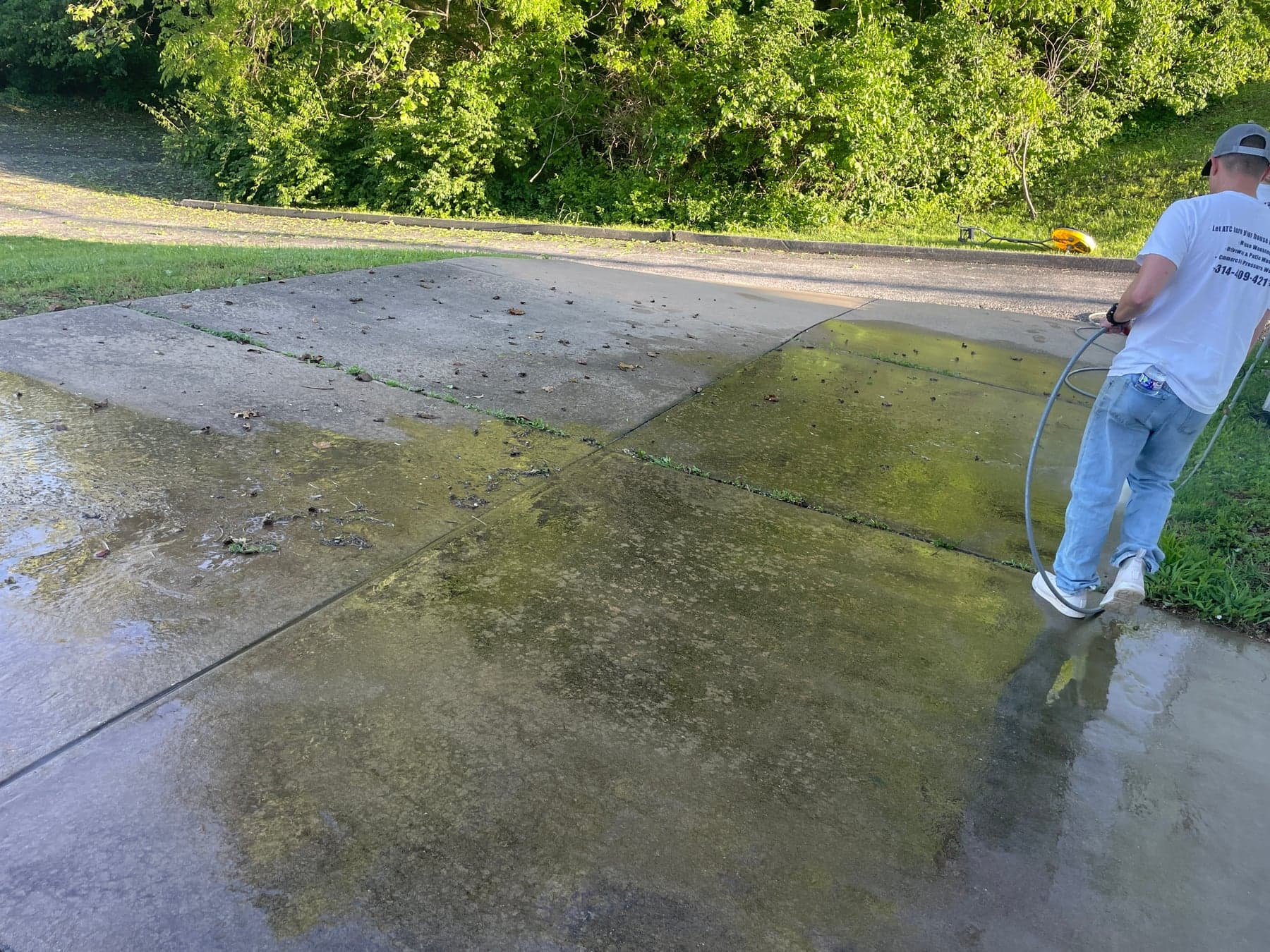 ATC cleaning concrete at a church property