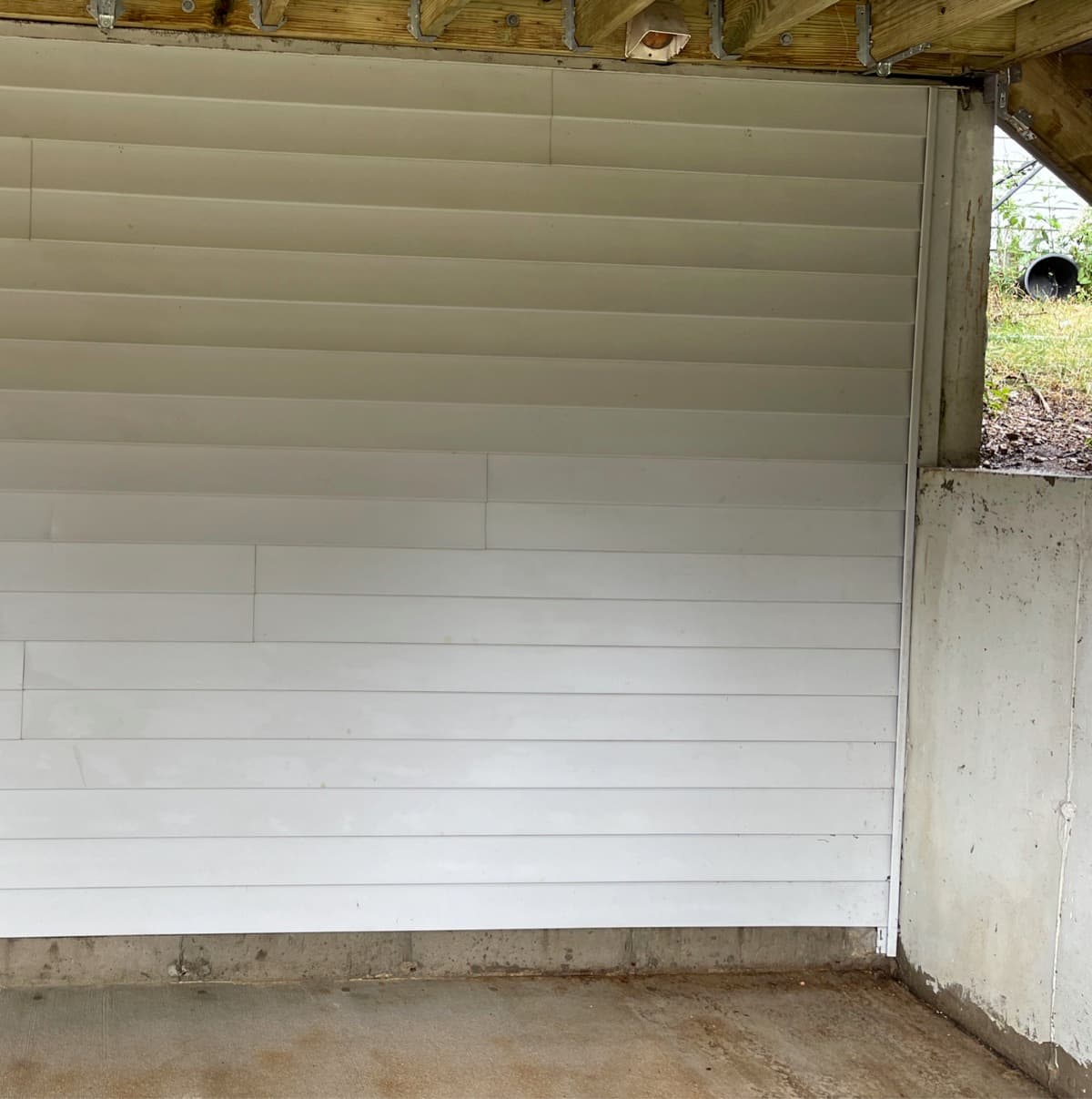 Exterior siding beneath a residential deck